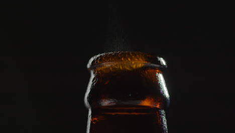 Close-Up-Of-Condensation-Droplets-On-Neck-Of-Bottle-Of-Cold-Beer-Or-Soft-Drink-With-Water-Vapour-After-Opening-3